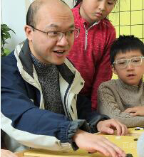 梁 程